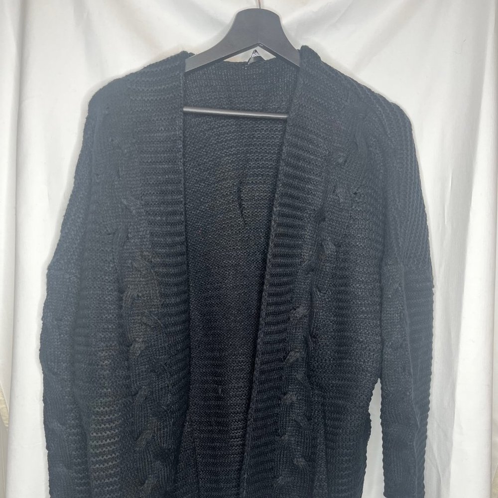 Women's Soft Knit Black Cardigans with Chunky Sleeves and an Open Front.